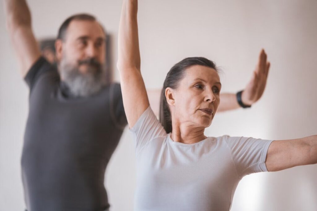 Older adults practicing balance exercises for Dr. Debbie Rose Pro Balance Academy. Older adults practicing balance exercises for Dr. Debbie Rose Pro Balance Academy.
